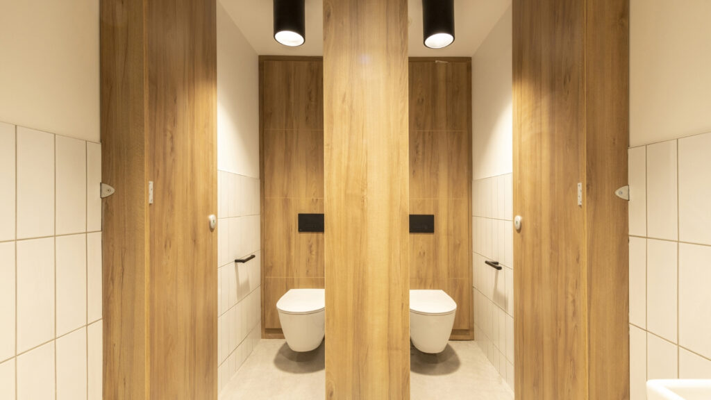 Full height high pressure laminate duct panels inside 2 cubicles