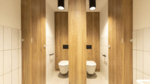 Full height high pressure laminate duct panels inside 2 cubicles